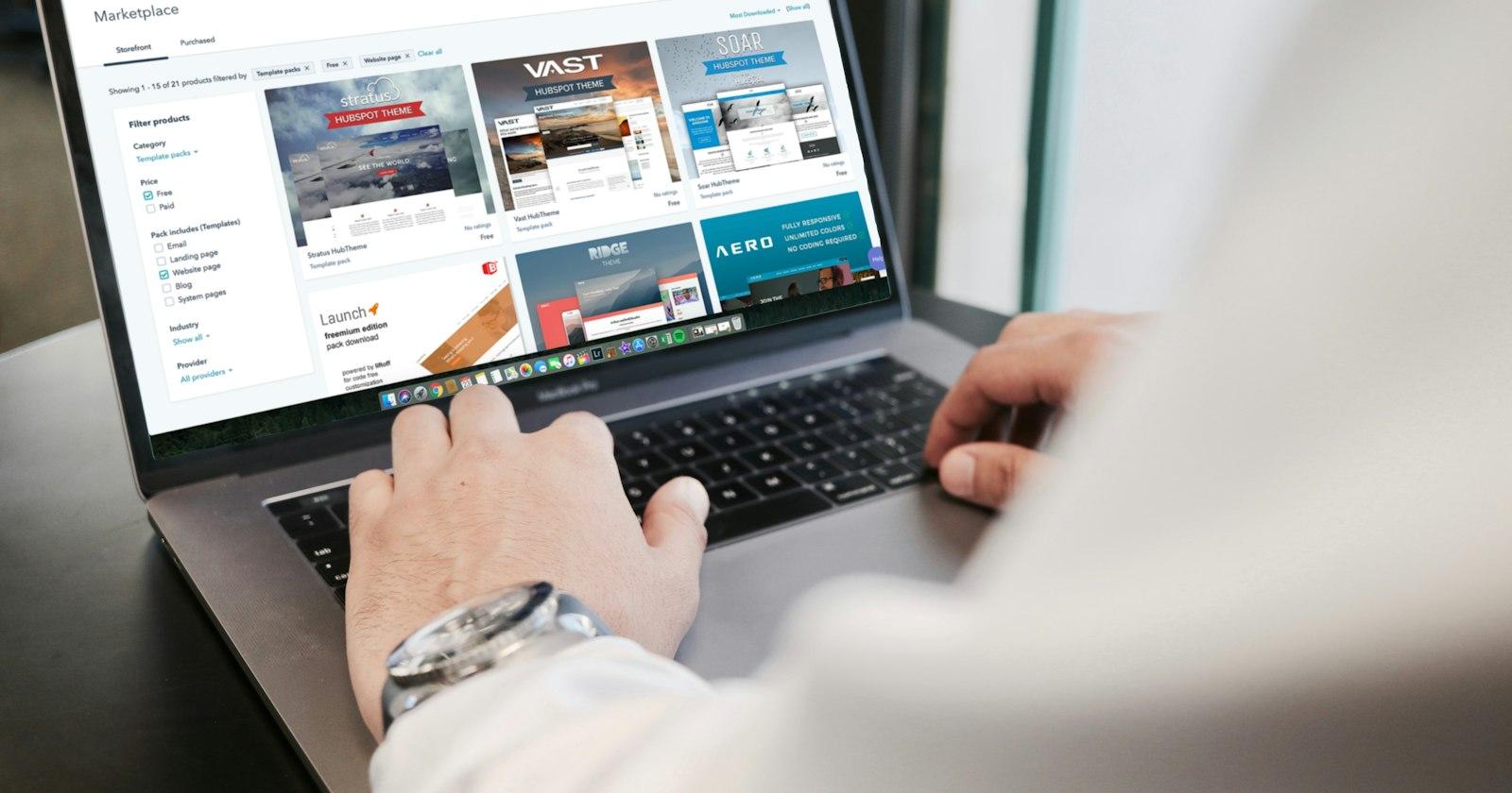 A person browsing web pages on a laptop